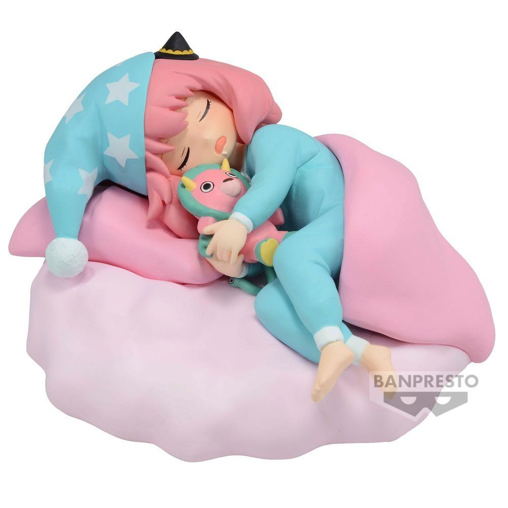 Anya Forger durmiendo en pijama sobre una almohada en forma de nube muy cómoda